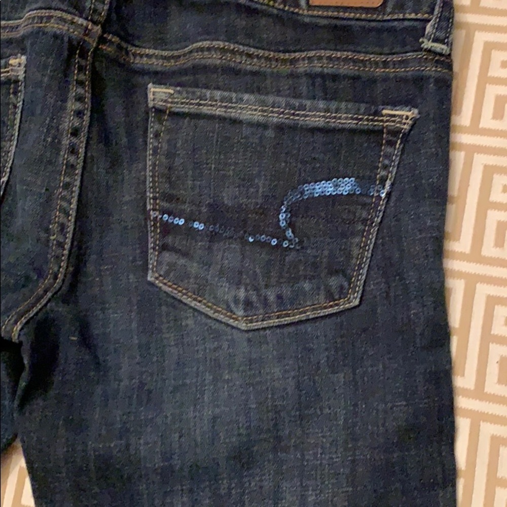 Dark distressed jeans